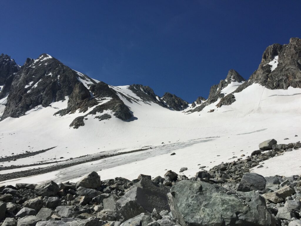 Gannet Peak in Wyoming, showing snow, glacier, and broken rocks 