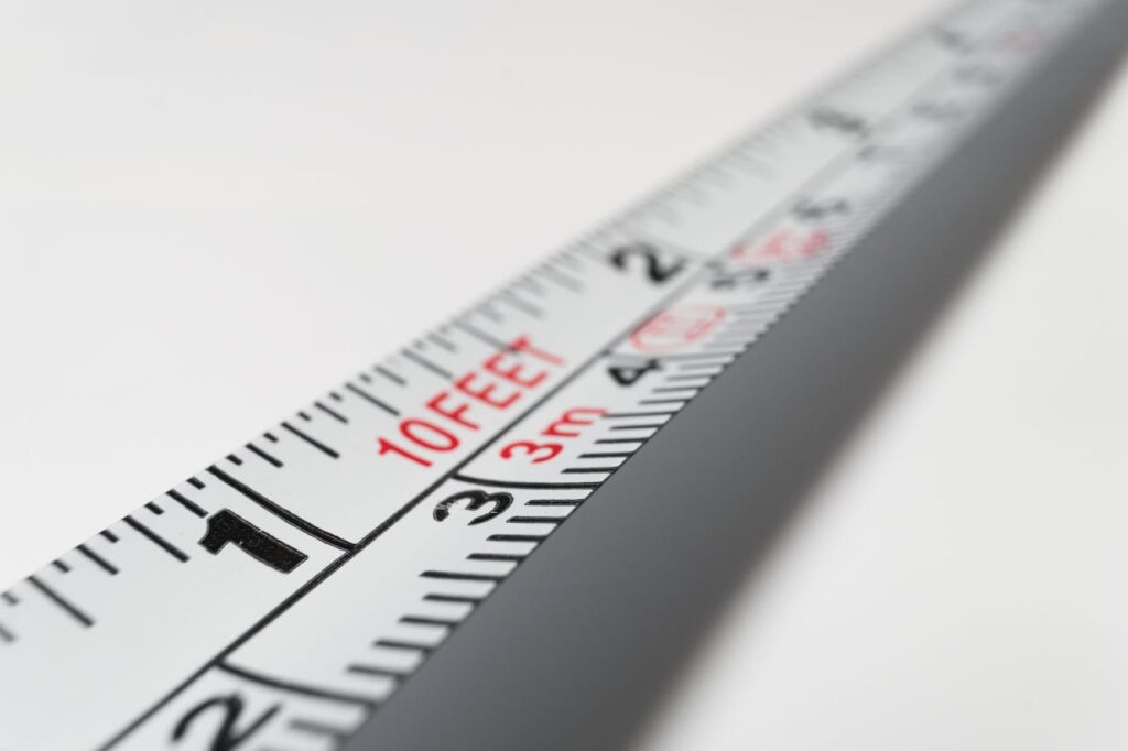 Tape measurer showing a few inches